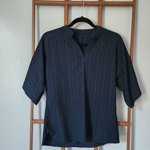 Stylish Navy Blouse with Subtle Pleats